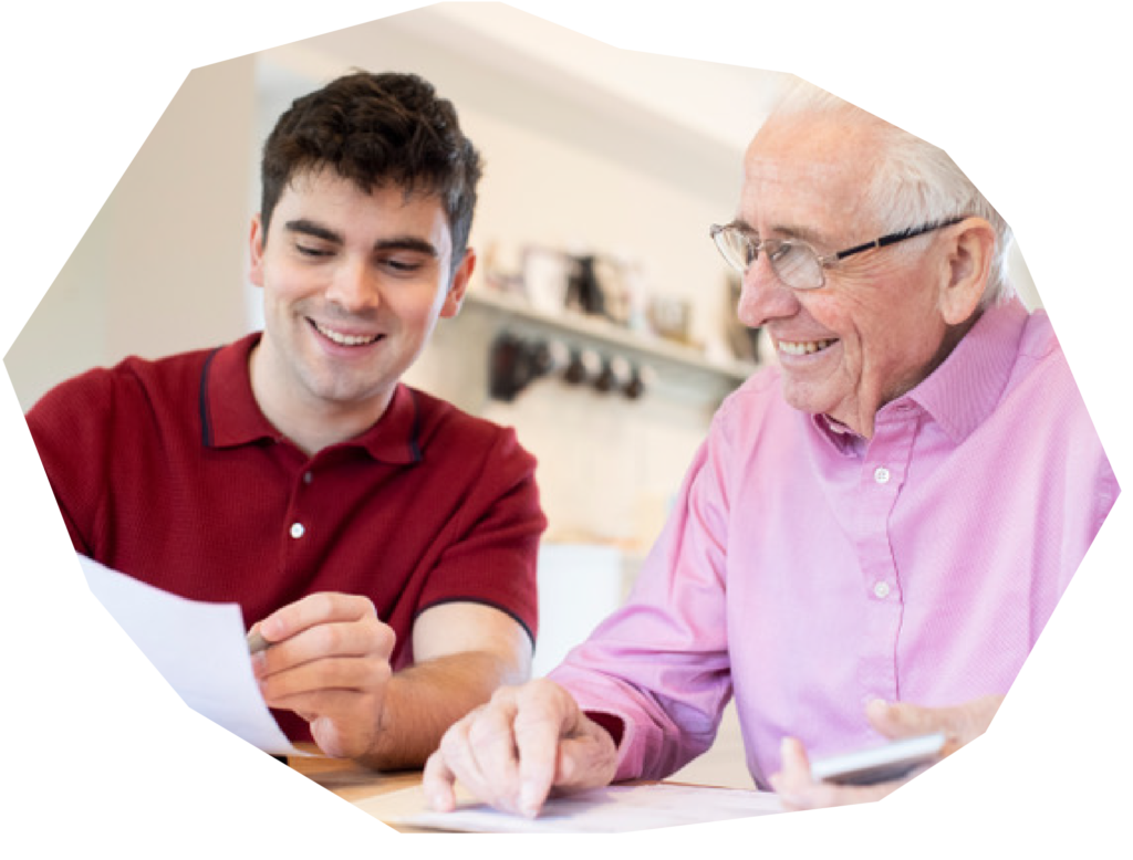 Carer and his client reading paperwork